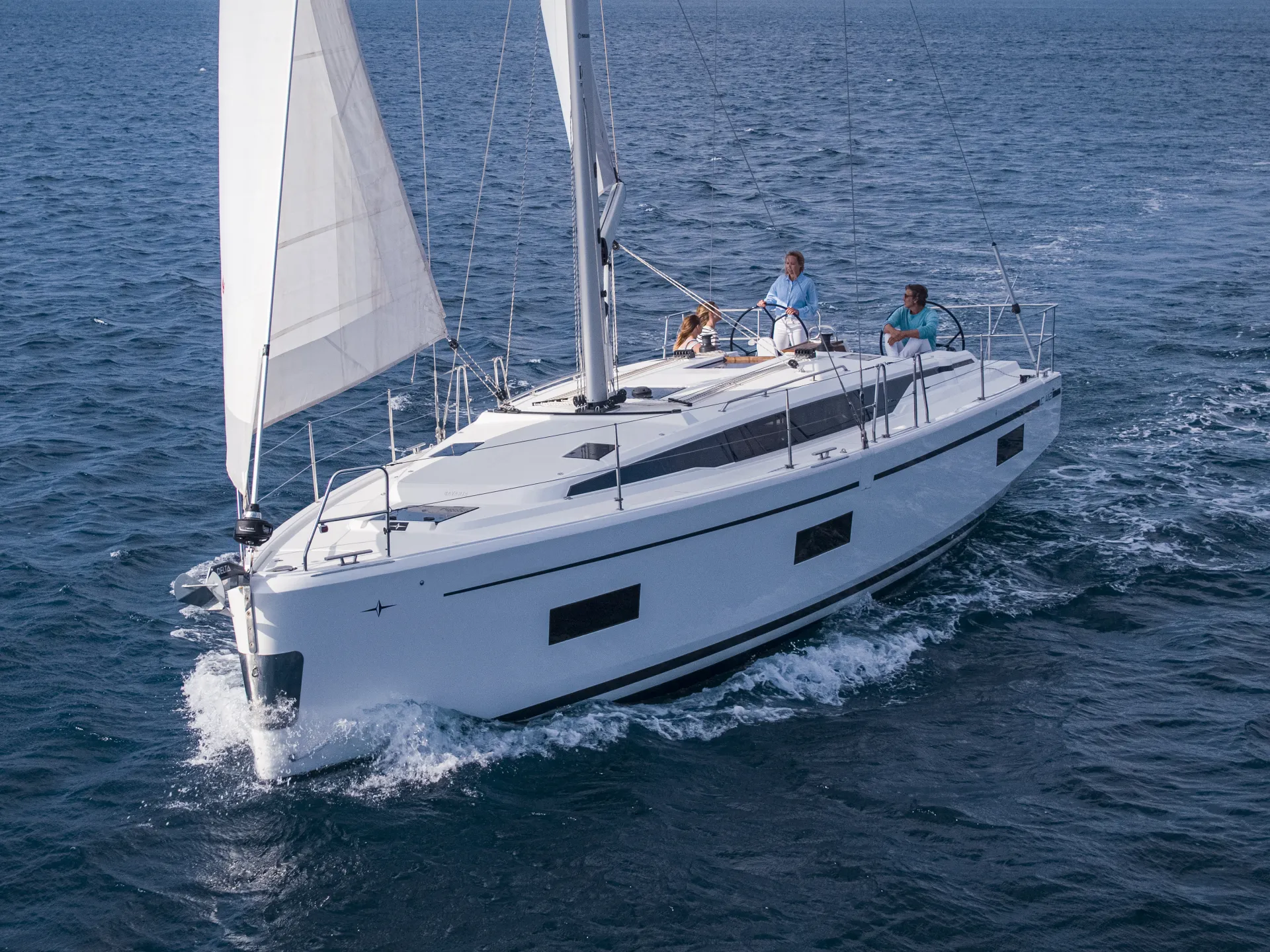 A white Bavaria C42 sailing boat with two people on board sails on calm blue water under a clear sky.